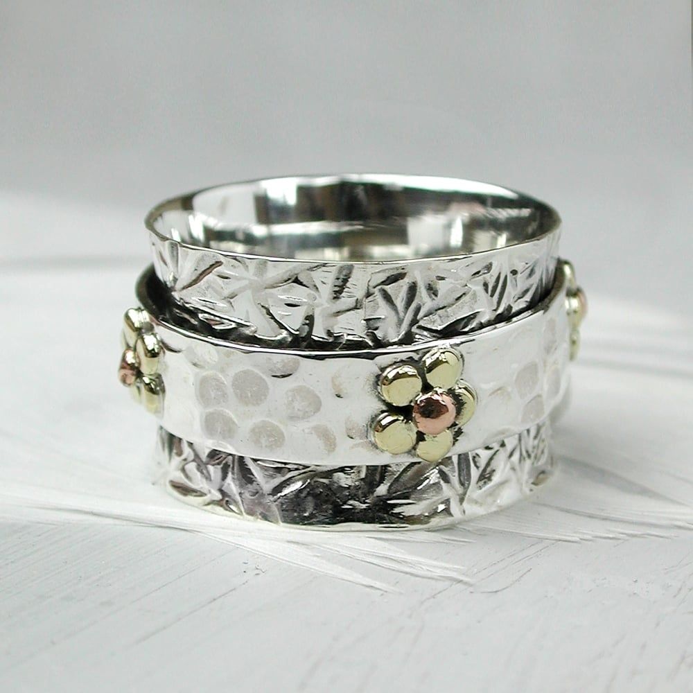 Decorative Band With Spinning Flower